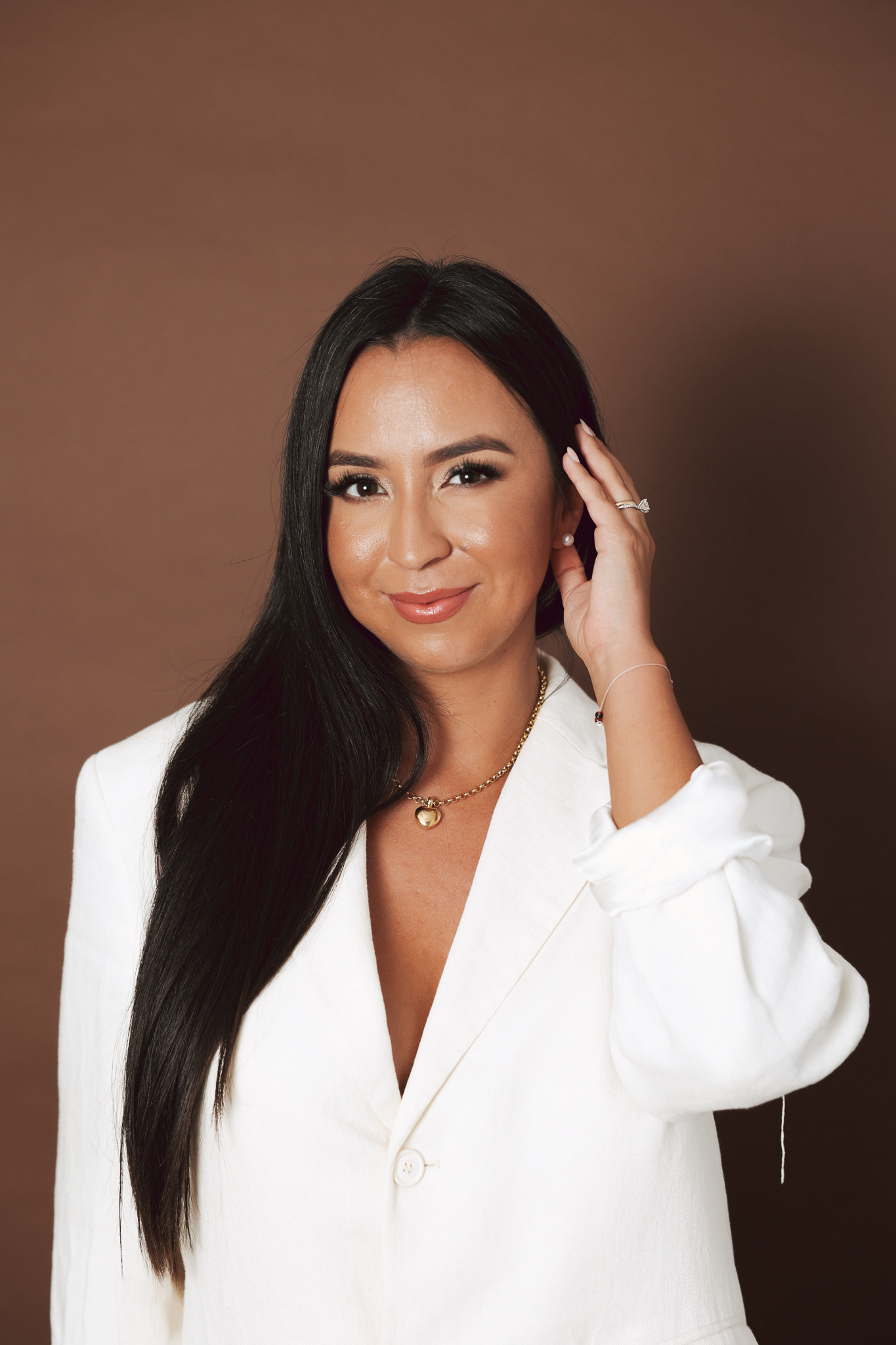 Maria Pancorbo smiling in a white blazer